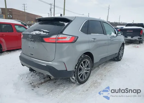 2021 Ford Edge Titanium z USA, uszkodzony, nr VIN 2FMPK4K93MBA58356